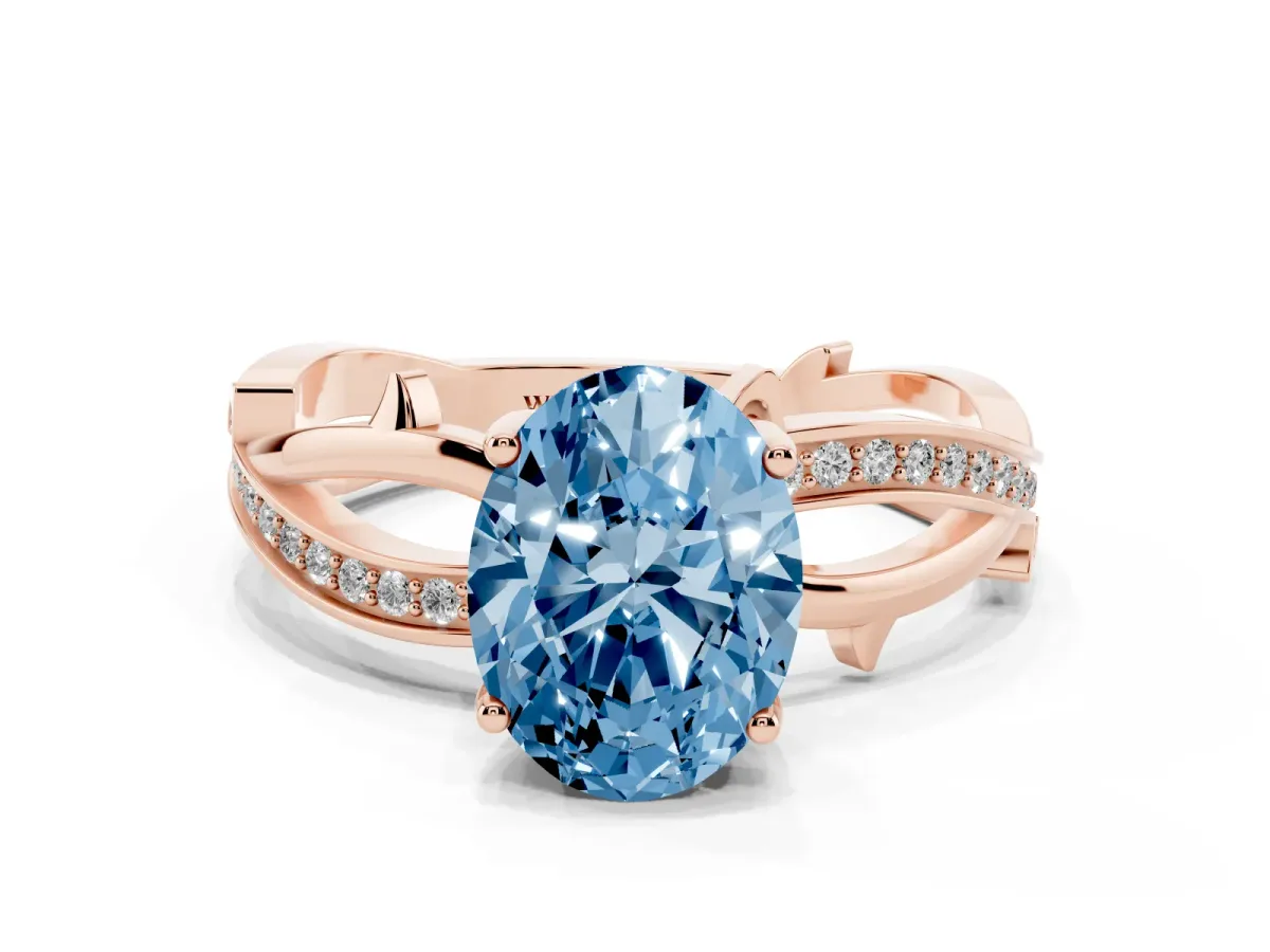 Fancy Blue Oval Cut Solitaire Twist Band with Pavé Accents and Four-Prong Setting Rose gold