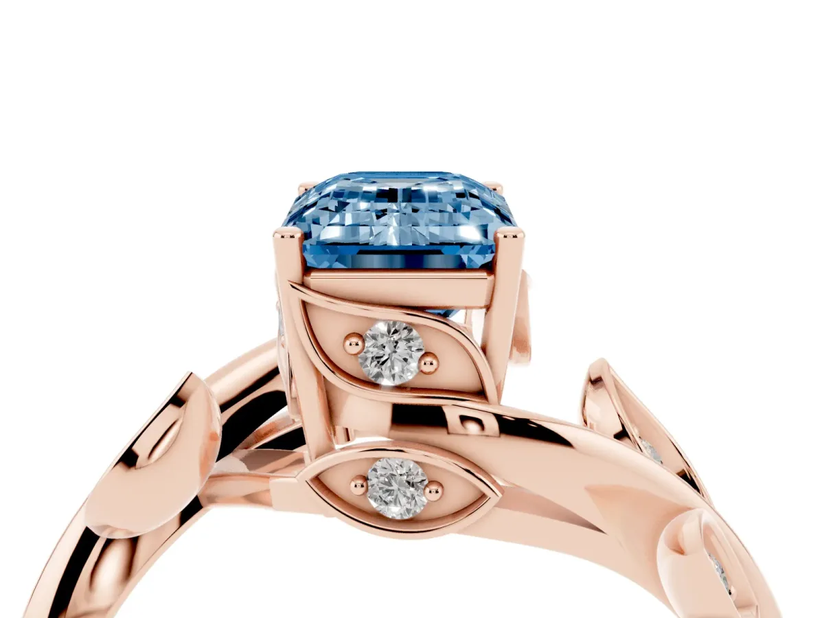 Fancy Blue Emerald Cut Solitaire Twist Engagement Ring with Leaf Accents and Prong Setting Rose gold