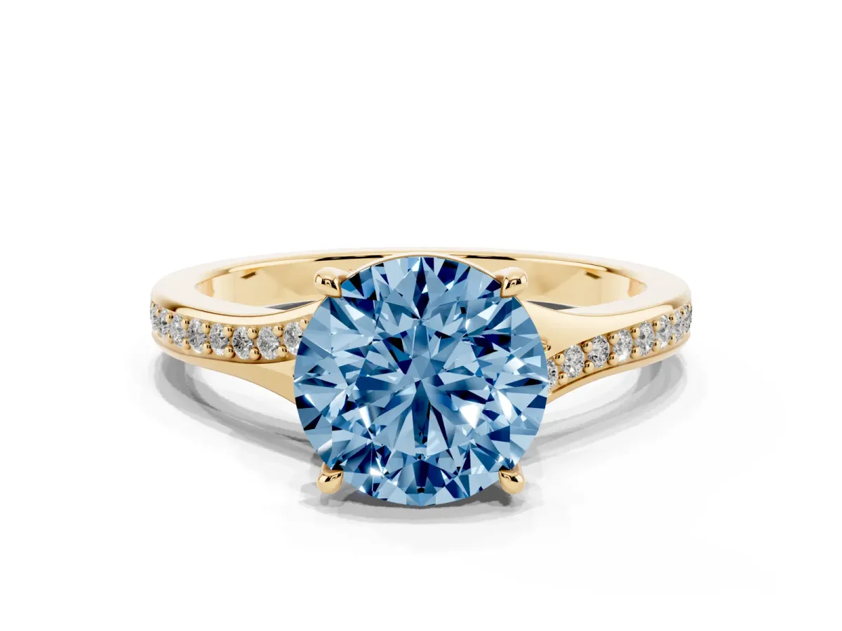 Fancy Blue Round Cut Diamond Solitaire Ring with Pavé Band and Prong Setting Yellow gold