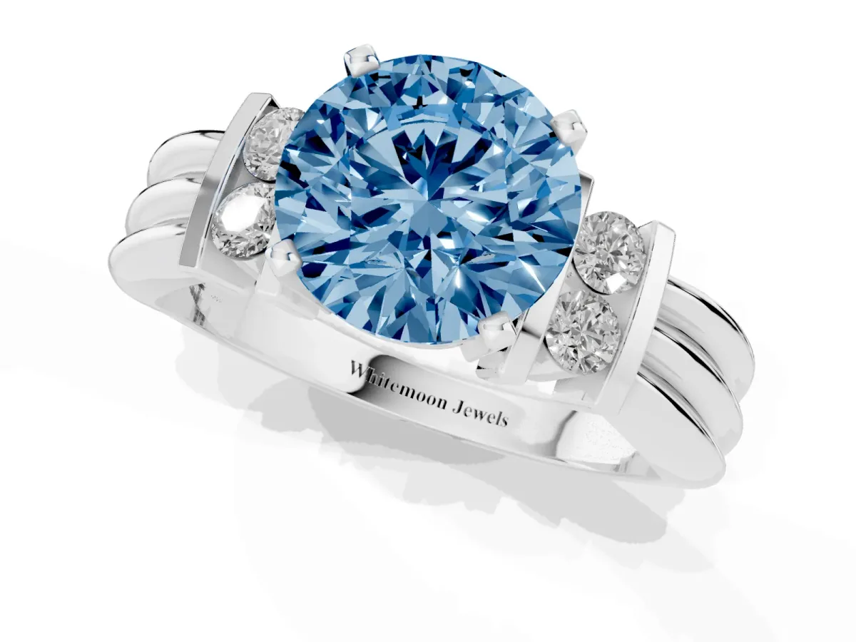 Fancy Blue Round Cut Cut Three-Stone Channel Set Ring with Bar Prongs Silver