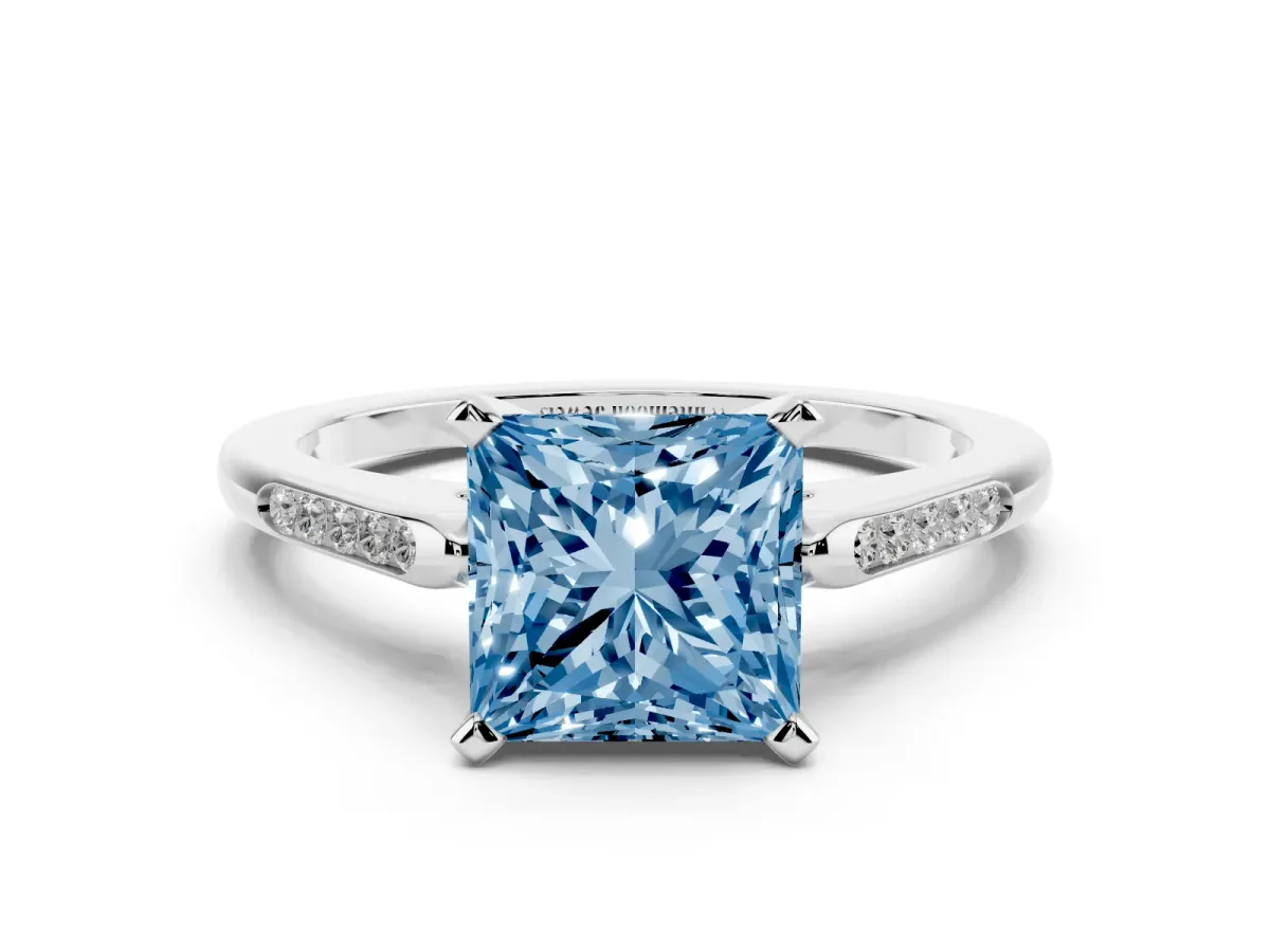 Fancy Blue Princess Cut Diamond Solitaire Ring with Channel Set Round Band and Prong Setting Silver