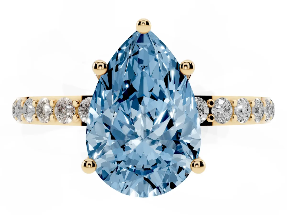 Fancy Blue Pear Cut Diamond Solitaire Ring with Round Pavé Shoulders and Prong Setting Yellow gold