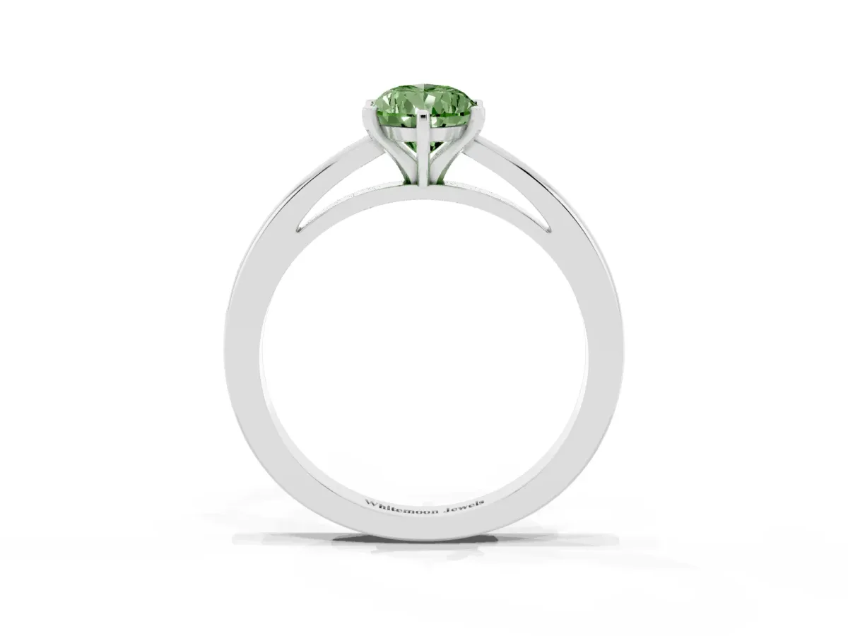 Fancy Green Pear Cut Solitaire Diamond Engagement Ring with Four-Prong Setting on a Classic Band Silver