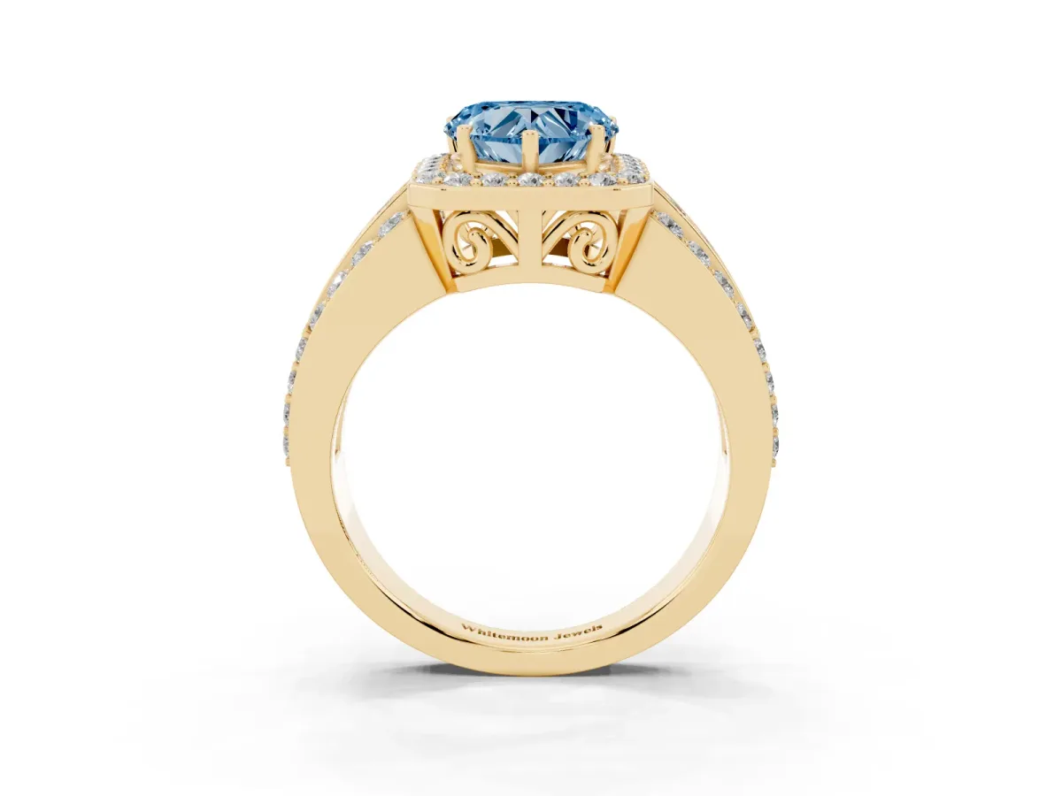 Fancy Blue Heart Cut Halo Diamond Ring with Round Split Shank and Prong Setting Yellow gold