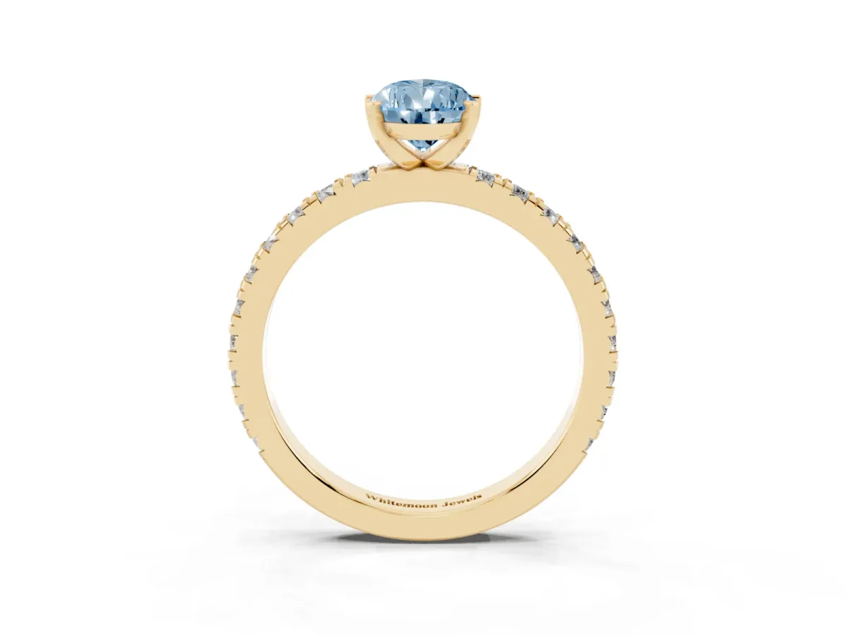 Fancy Blue Pear Cut Diamond Pavé Band Solitaire with Four-Prong Setting Yellow gold