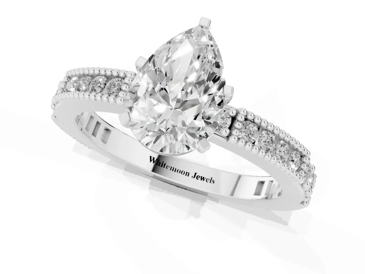Pear Cut Solitaire with Pavé Band and Four-Prong Setting White gold