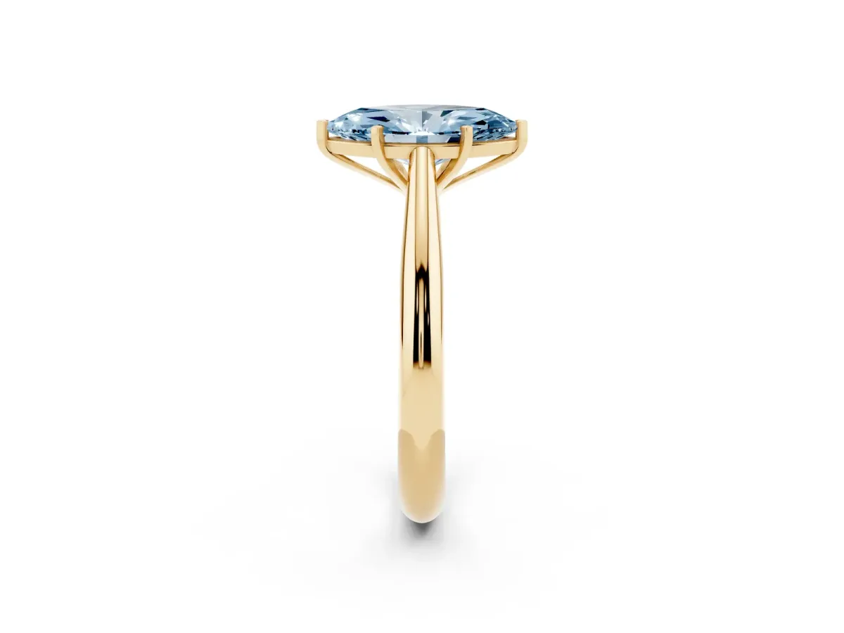 Fancy Blue Marquise Cut Diamond Solitaire Engagement Ring with Cathedral Setting and Four-Prong Mount Yellow gold