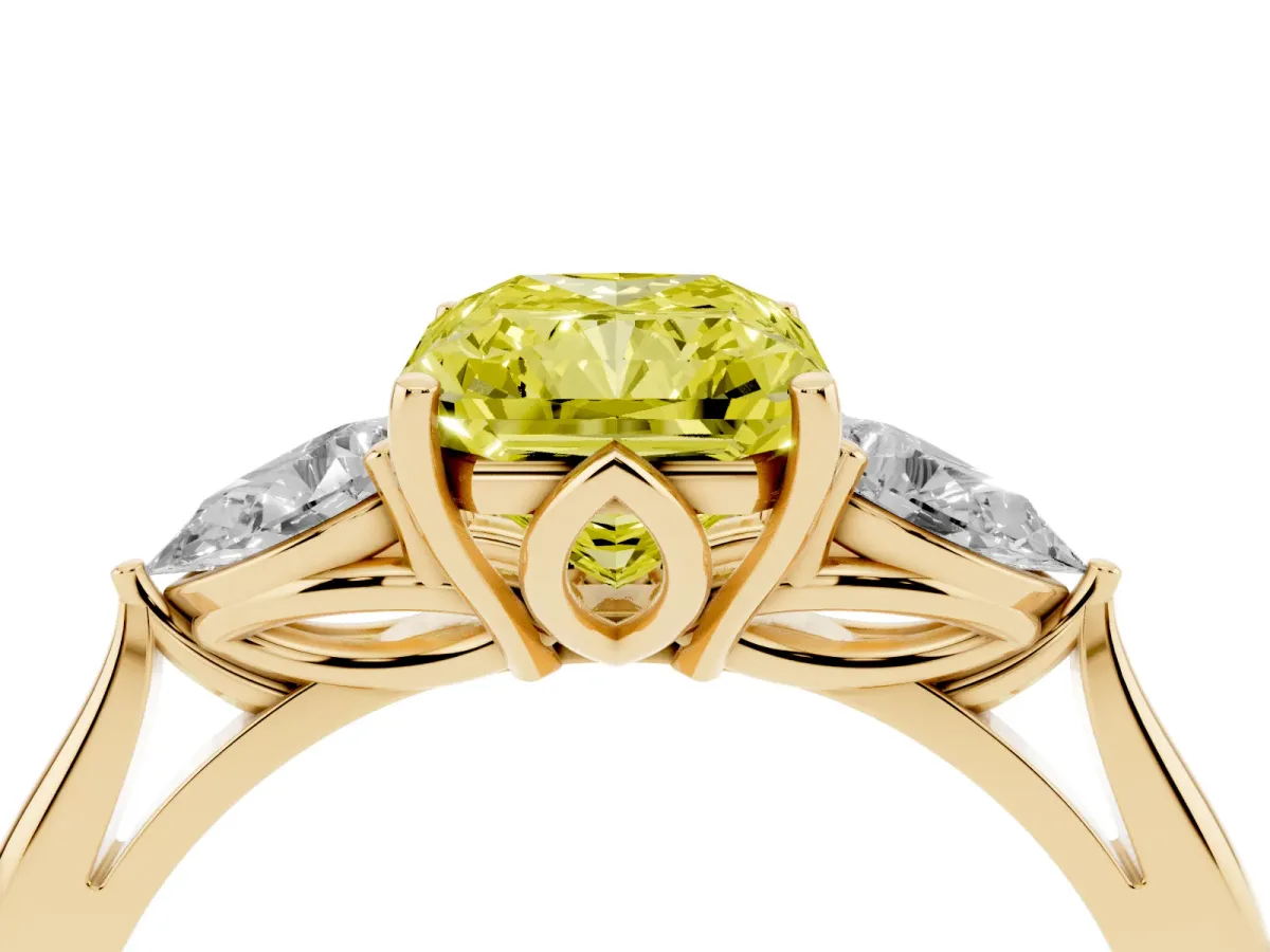 Fancy Yellow Three-Stone Radiant Cut Diamond Ring with Pear Side Stones in Four-Prong Setting Yellow gold