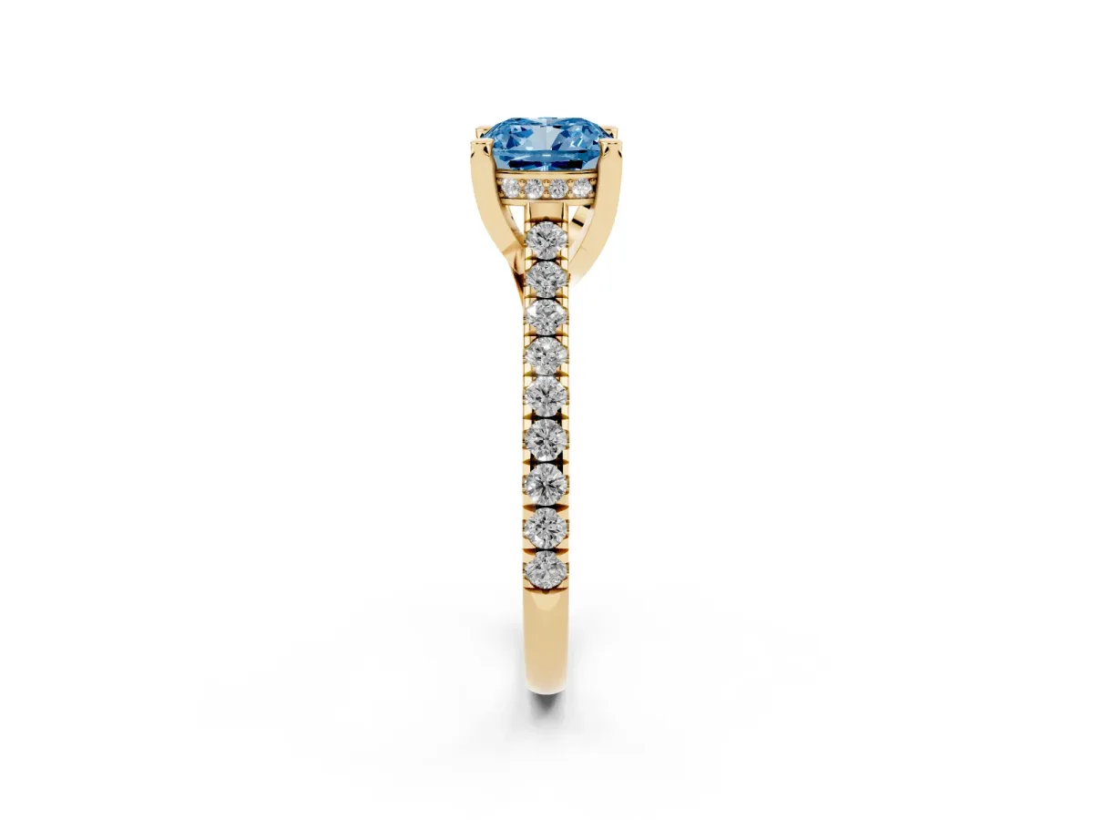 Fancy Blue Cushion Cut Brilliant Diamond Solitaire with Pavé Band and Four-Prong Setting Yellow gold