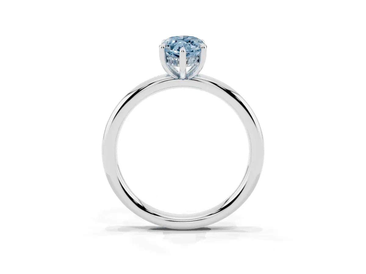 Fancy Blue Marquise Cut Diamond Solitaire Ring with Thin Band and Four-Prong Setting Silver