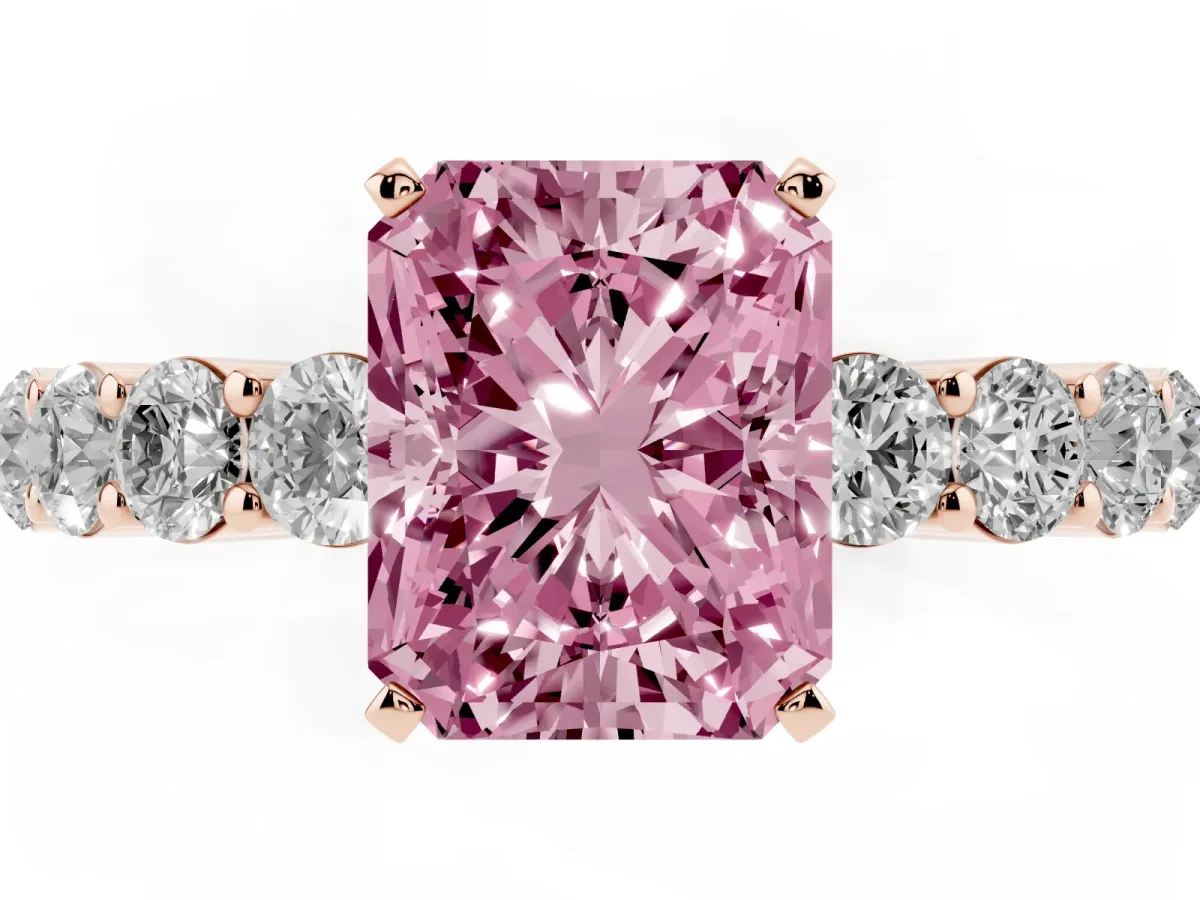 Fancy Pink Radiant Cut Diamond Solitaire Ring with Shared Prong Round Side Stones Rose gold