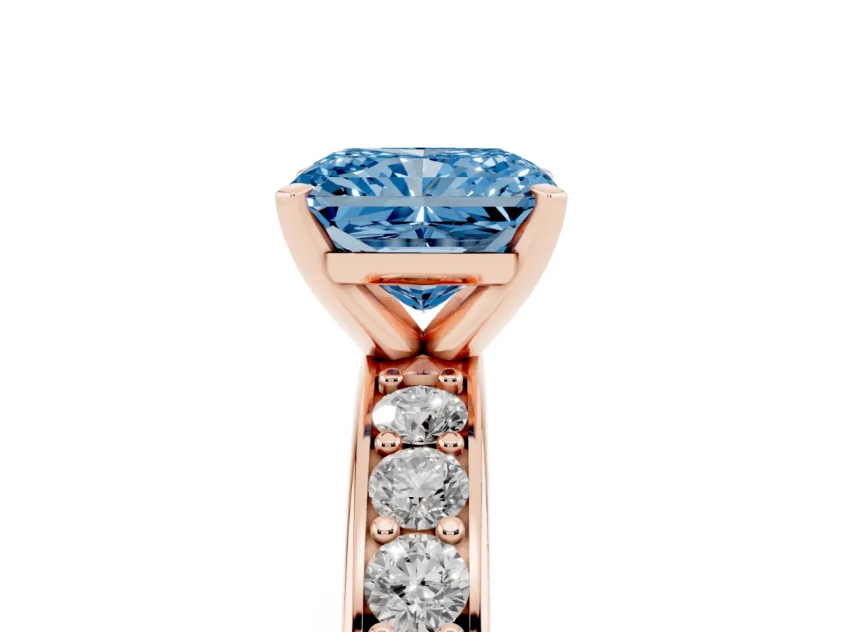 Fancy Blue Radiant Cut Diamond Engagement Ring with Channel Set Round Band and Prong Setting Rose gold