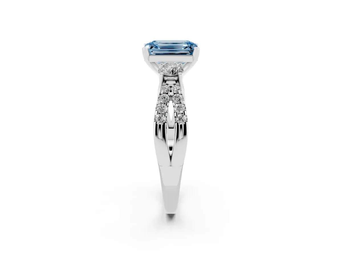 Fancy Blue Emerald Cut Diamond Three-Stone Ring with Pavé Split Shank and Four-Prong Setting Silver