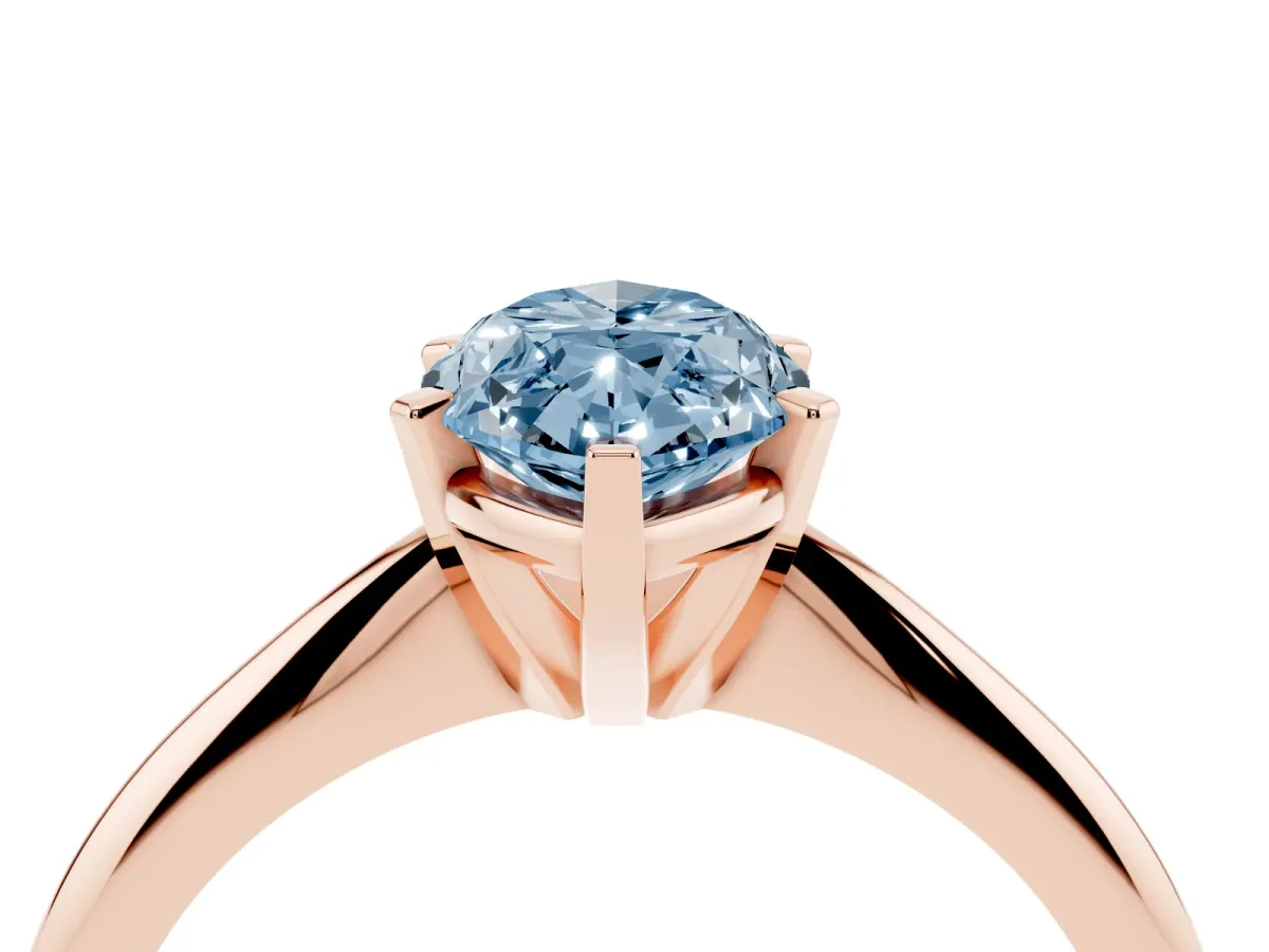 Fancy Blue Marquise Cut Cut Solitaire Ring with Four-Prong Setting on a Classic Band Rose gold