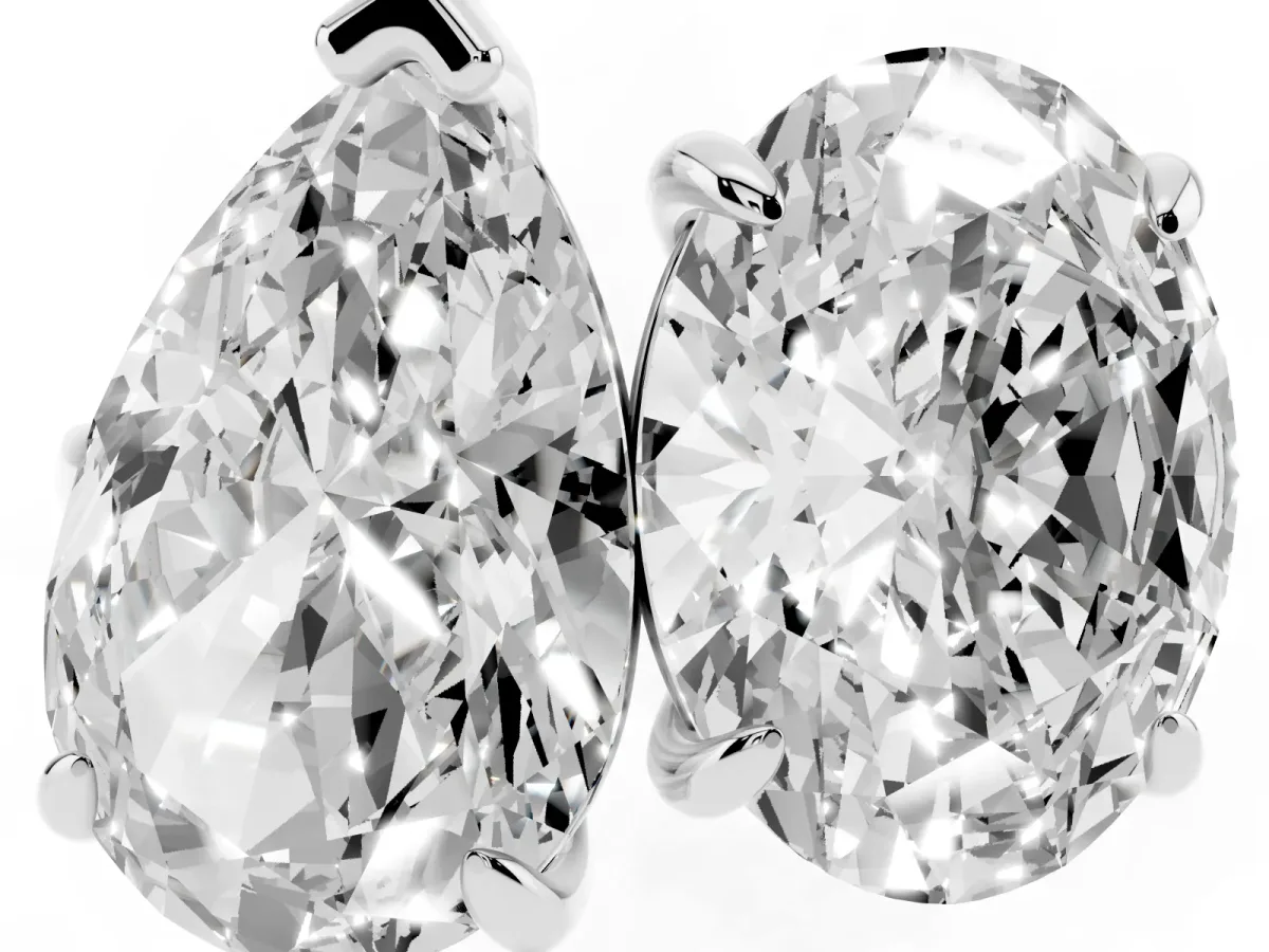 Oval and Pear Toi Moi Ring with Prong Setting and Plain Band White gold