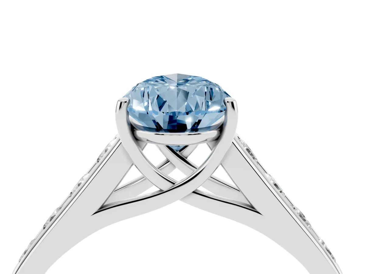 Fancy Blue Pear Cut Solitaire Channel-Set Diamond Engagement Ring with Four-Prong Setting Platinum