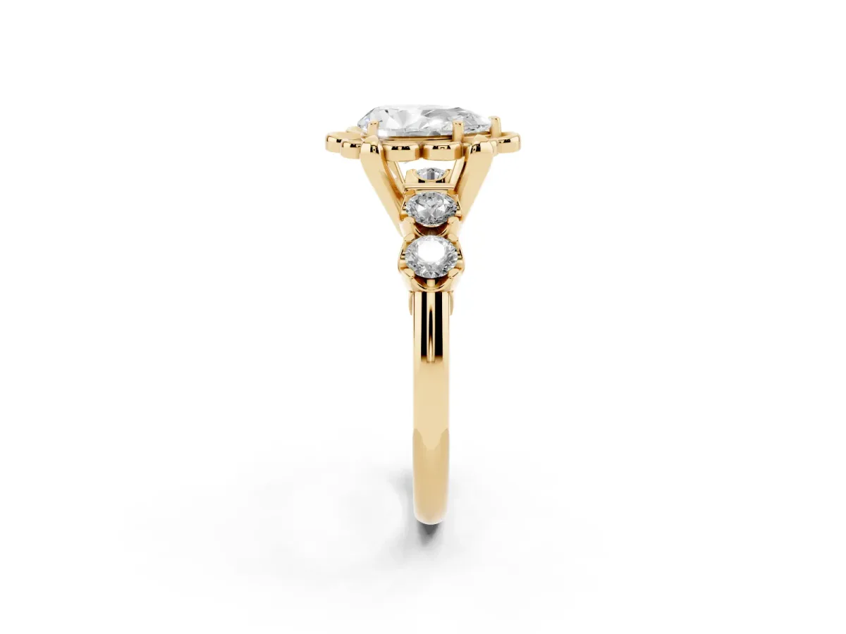 Pear Cut Cut Diamond Floral Halo Engagement Ring with Shared Prong Setting Yellow gold