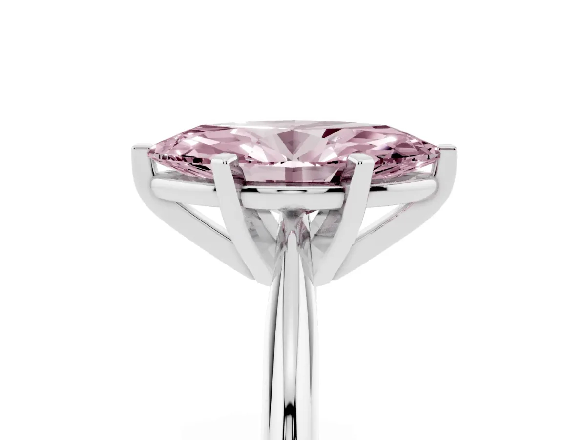 Fancy Pink Marquise Cut Cut Solitaire Ring with Four-Prong Setting on a Classic Band Silver