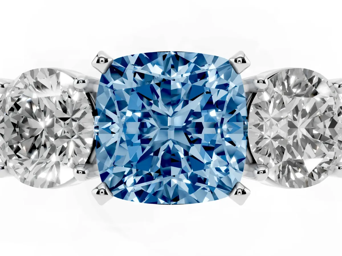 Fancy Blue Three-Stone Cushion Cut Diamond Ring with Round Side Stones, Classic Band, and Four-Prong Setting White gold