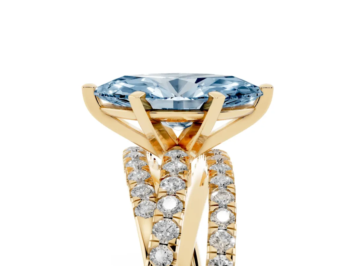 Fancy Blue Marquise Cut Solitaire Twist Band with Pavé Setting and Four-Prong Setting Yellow gold