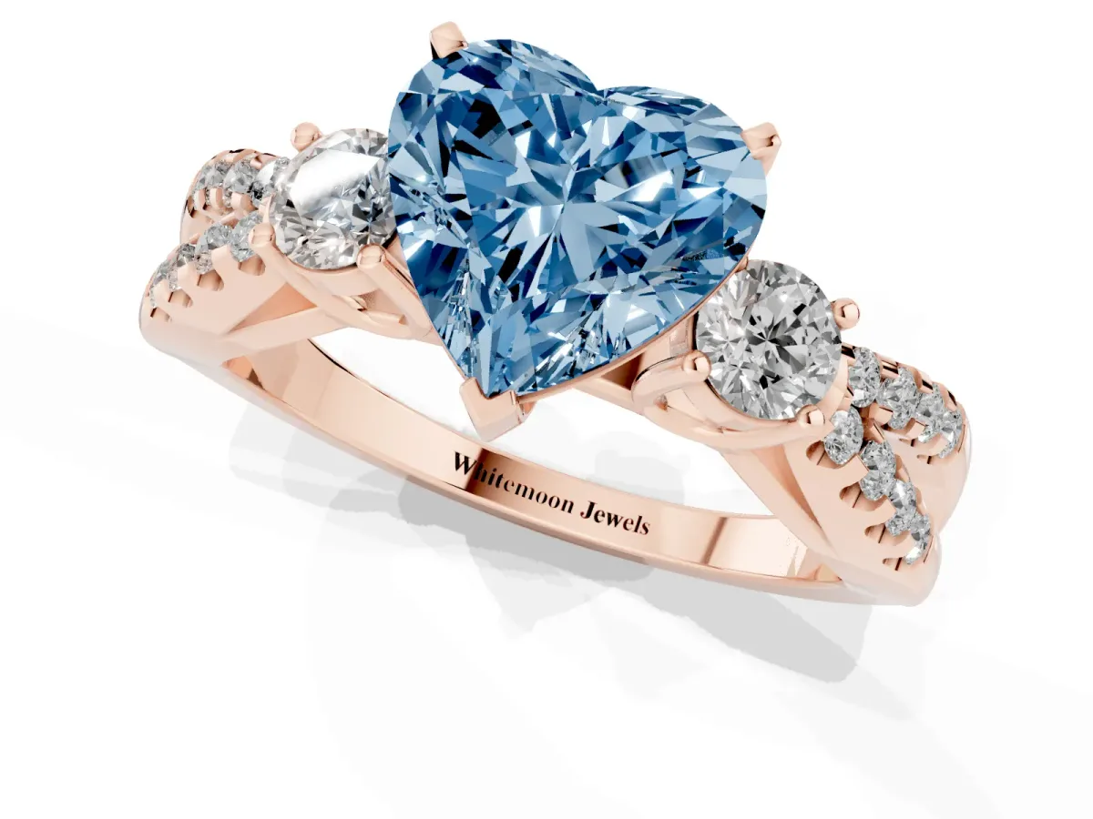 Fancy Blue Heart Cut Diamond Three-Stone Ring with Pavé Split Shank and Four-Prong Setting Rose gold