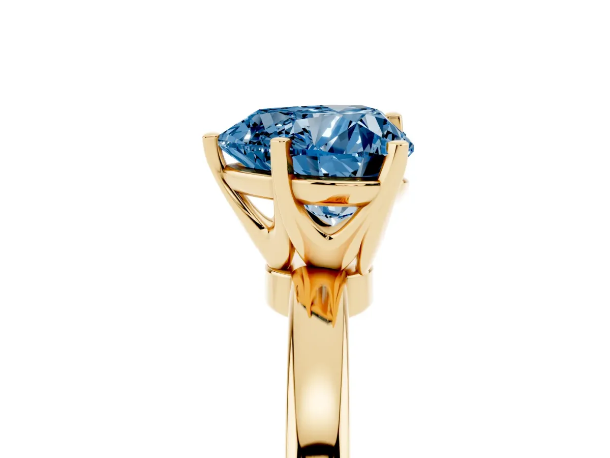Fancy Blue Heart Cut Solitaire Diamond Ring with Six-Prong Setting on a Classic Band Yellow gold