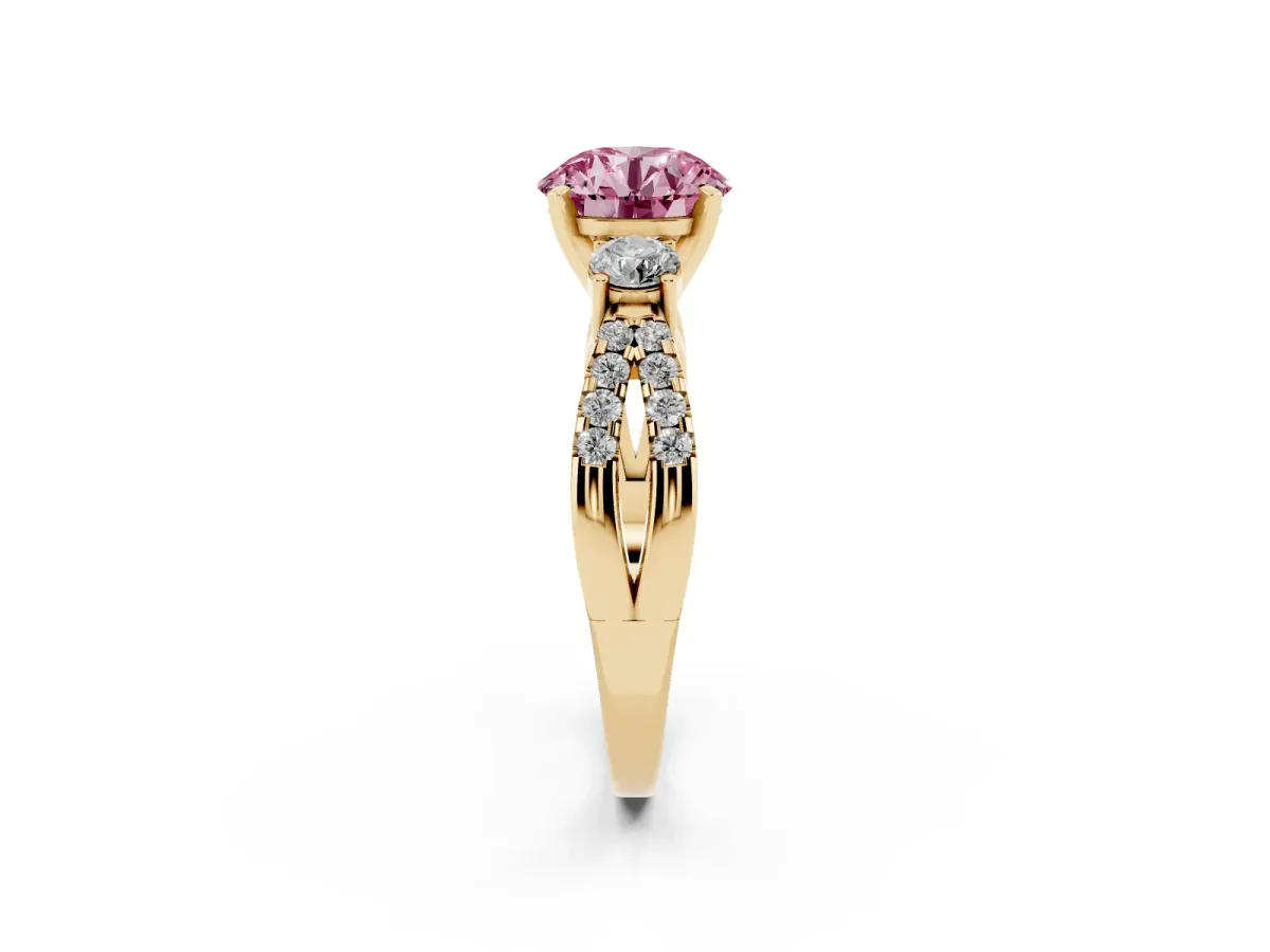 Fancy Pink Round Cut Diamond Three-Stone Ring with Pavé Split Shank and Four-Prong Setting Yellow gold
