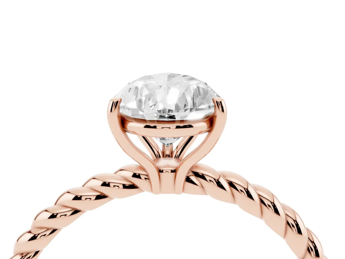 Pear Cut Solitaire Twist Band Ring with Four-Prong Setting Rose gold