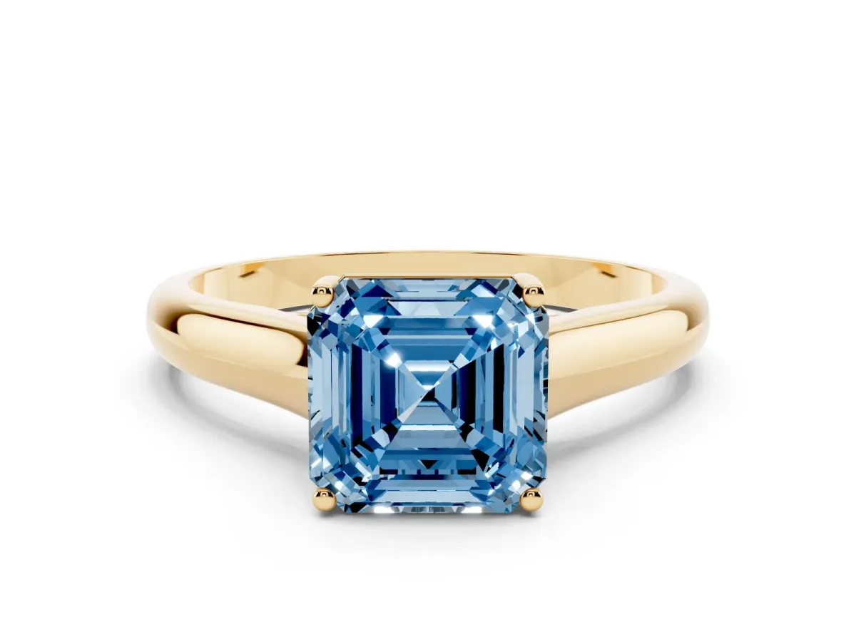 Fancy Blue Asscher Cut Solitaire Engagement Ring with Tapered Band and Four-Prong Setting Yellow gold