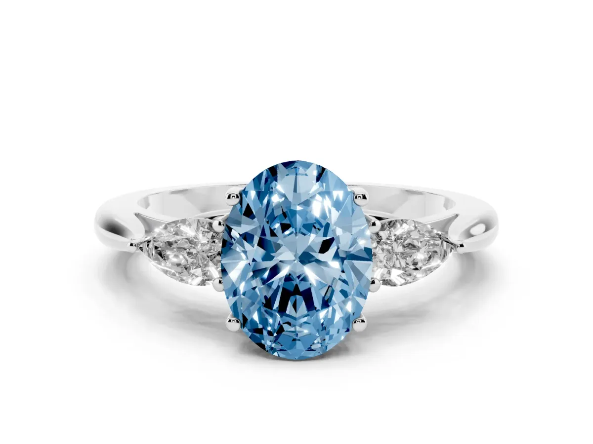 Fancy Blue Oval Cut Diamond Three-Stone Ring with Pear Side Stones and Prong Setting White gold