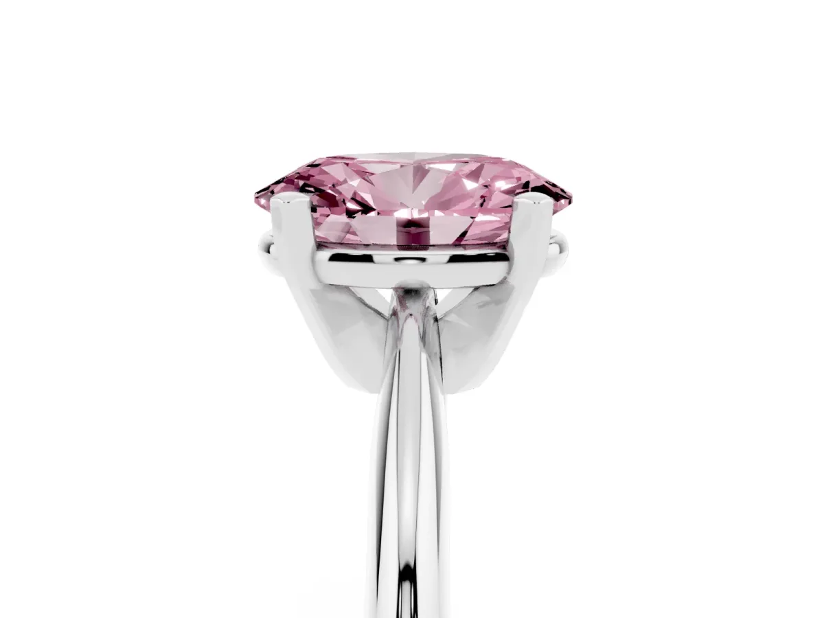 Fancy Pink Oval Cut Cut Solitaire Ring with Four-Prong Setting on a Classic Band Silver