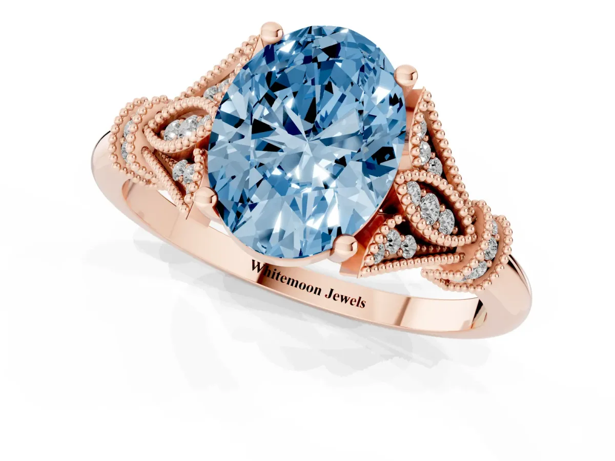 Fancy Blue Oval Cut Diamond Solitaire Ring with Floral Filigree and Pave Accents Rose gold