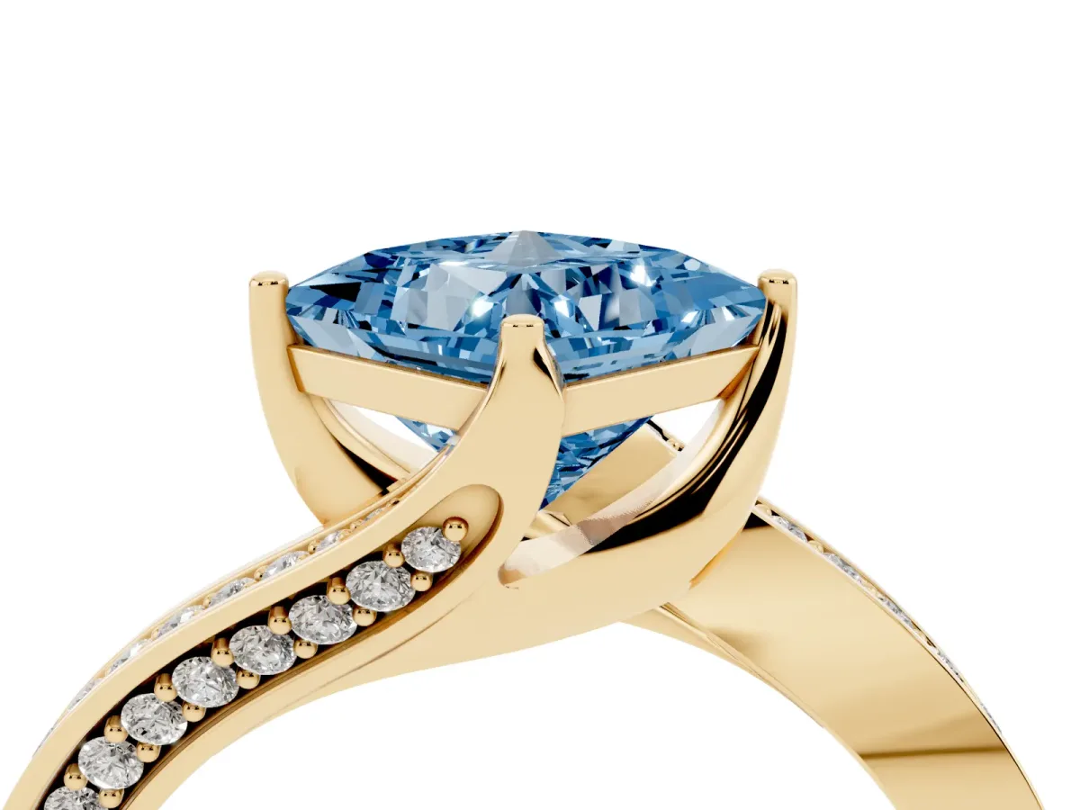 Fancy Blue Princess Cut Solitaire Diamond Twist Band with Pavé Setting and Four-Prong Setting Yellow gold
