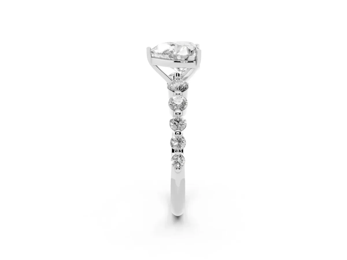 Heart Cut Solitaire Diamond Ring with Pave Band and Four-Prong Setting Silver
