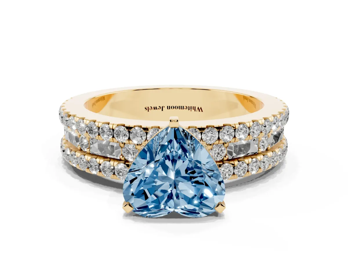 Fancy Blue Heart Cut Diamond Solitaire Ring with Pavé and Channel Set Band Yellow gold