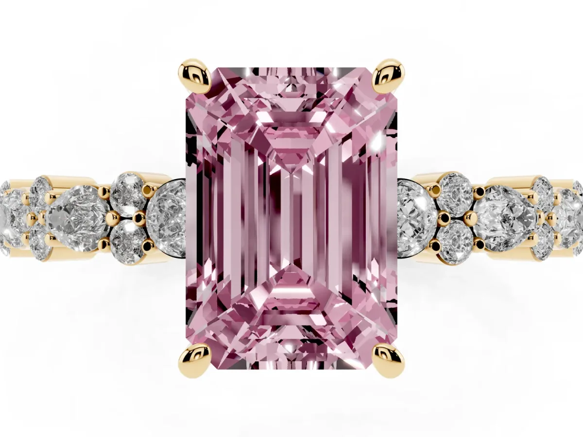 Fancy Pink Emerald Cut Diamond Side Stone Solitaire Ring with Round and Four-Prong Setting Yellow gold