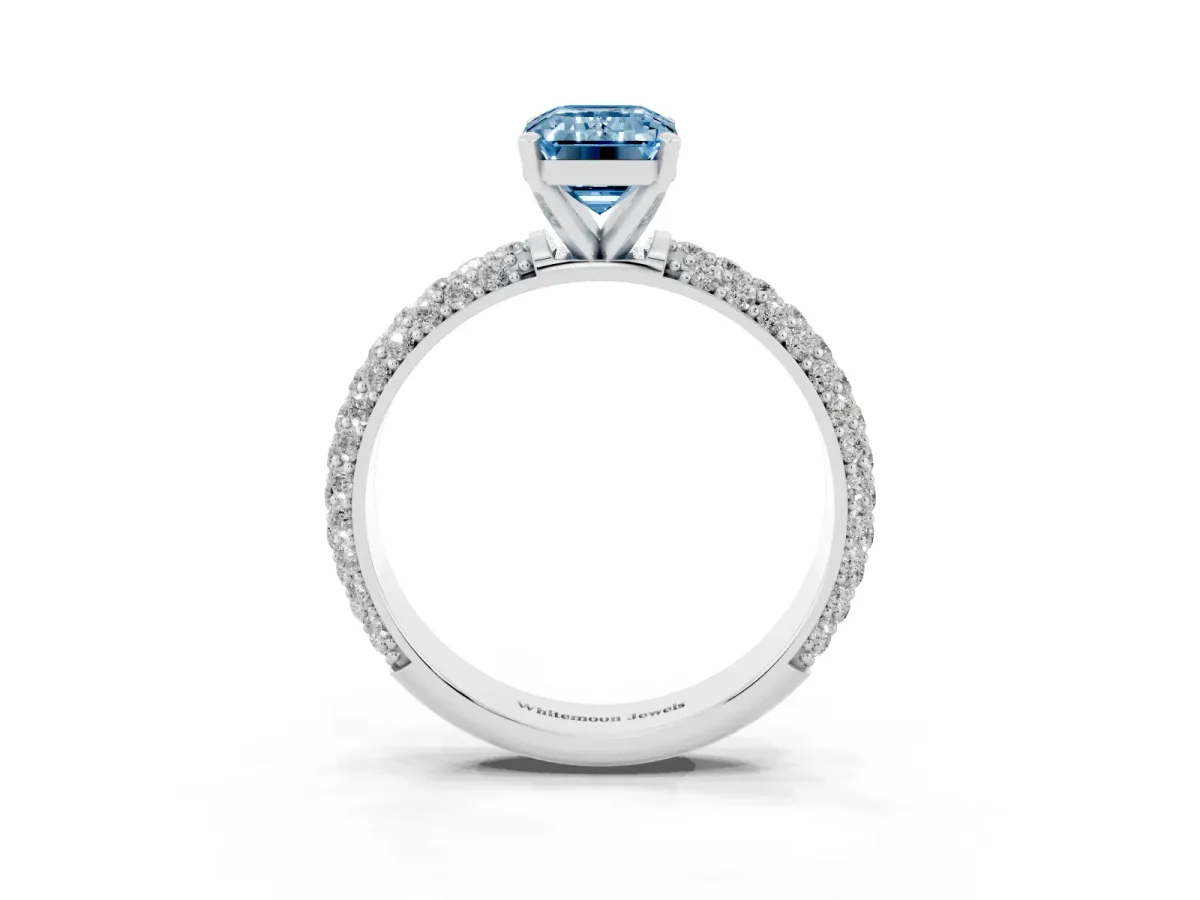 Fancy Blue Emerald Cut Diamond Solitaire Ring with Prong Setting and Pavé Band Silver