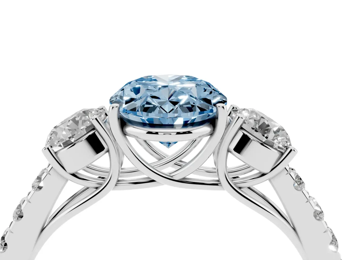 Fancy Blue Oval Cut Cut Diamond Three-Stone Ring with Round Side Stones and Pavé Band Silver