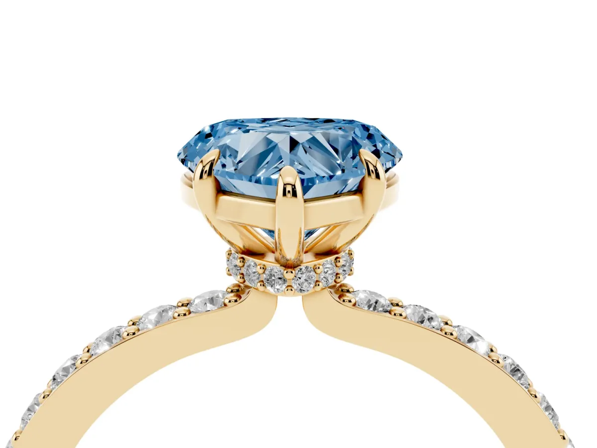 Fancy Blue Heart Cut Diamond Pavé Engagement Ring with Round Accents and Prong Setting Yellow gold