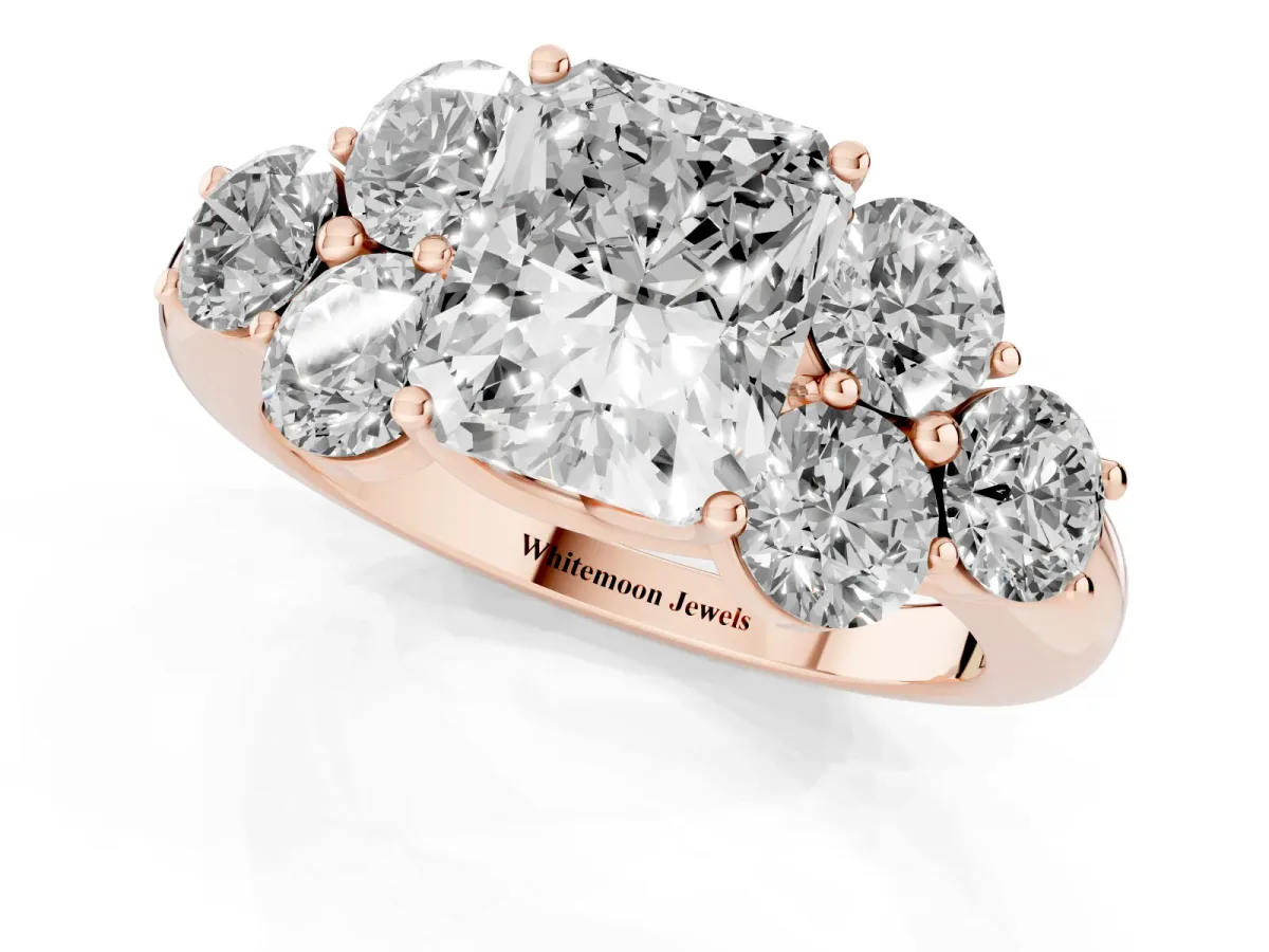 Radiant Cut Cut Diamond Cluster Ring with Round Accent Stones and Prong Setting on a Classic Band Rose gold