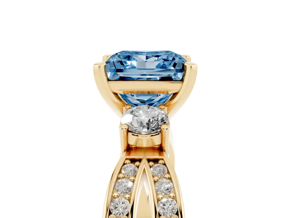 Fancy Blue Three-Stone Princess Cut Cut Diamond Twist Band with Prong Setting Yellow gold