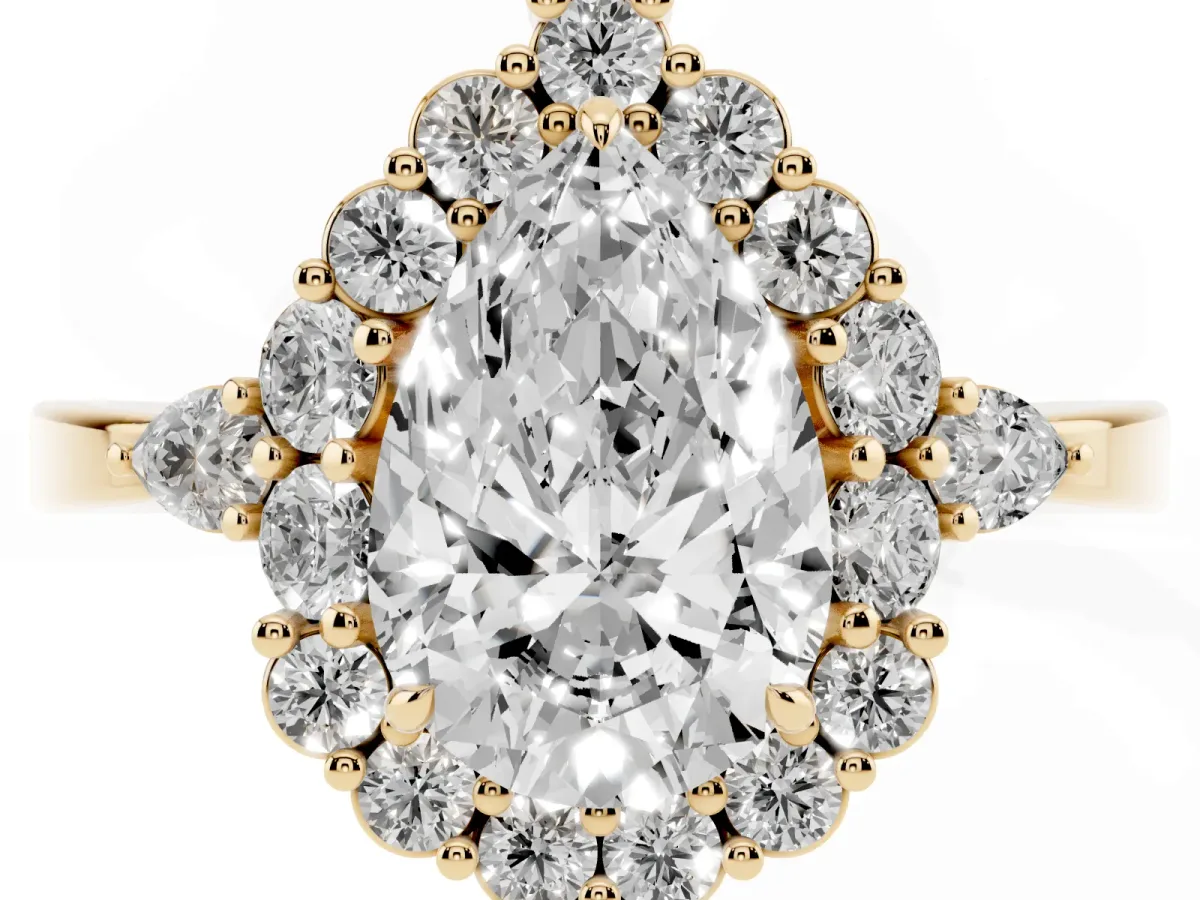 Pear Cut Diamond Halo Ring with Pear Side Stones and Prong Setting Yellow gold