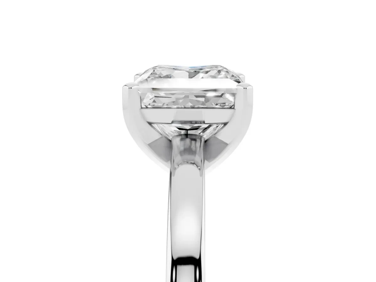 Princess Cut Solitaire Diamond Engagement Ring with Four-Prong Setting on a Classic Band Silver