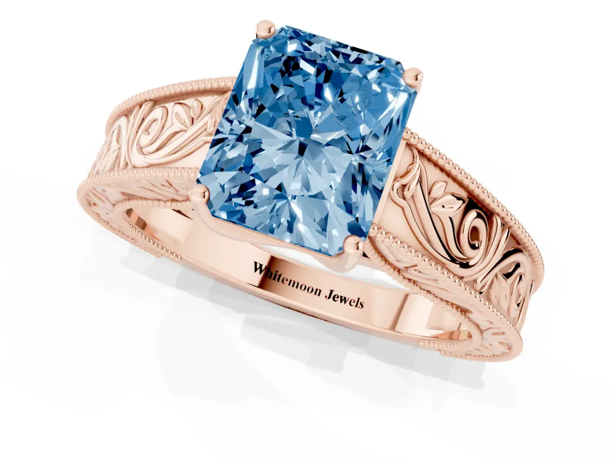 Fancy Blue Radiant Cut Diamond Solitaire Ring with Engraved Band and Four-Prong Setting Rose gold