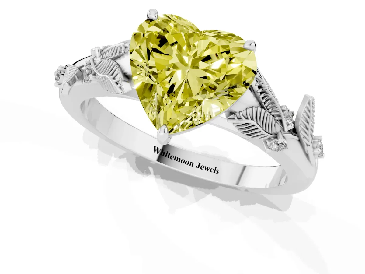 Fancy Yellow Heart Cut Diamond Solitaire Ring with Leaf Motif Band and Four-Prong Setting Silver