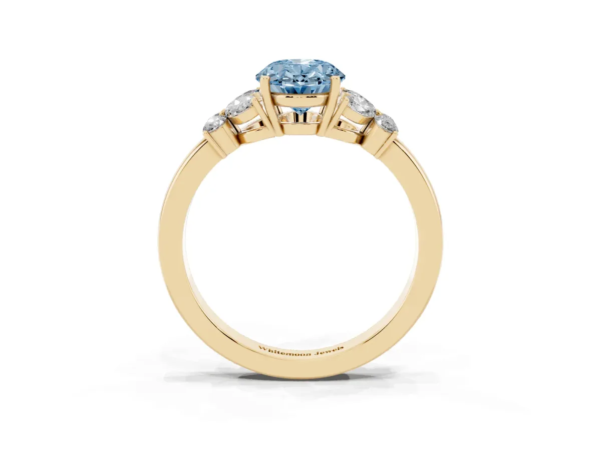 Fancy Blue Oval Cut Cut Solitaire Floral Diamond Ring with Four-Prong Setting Yellow gold