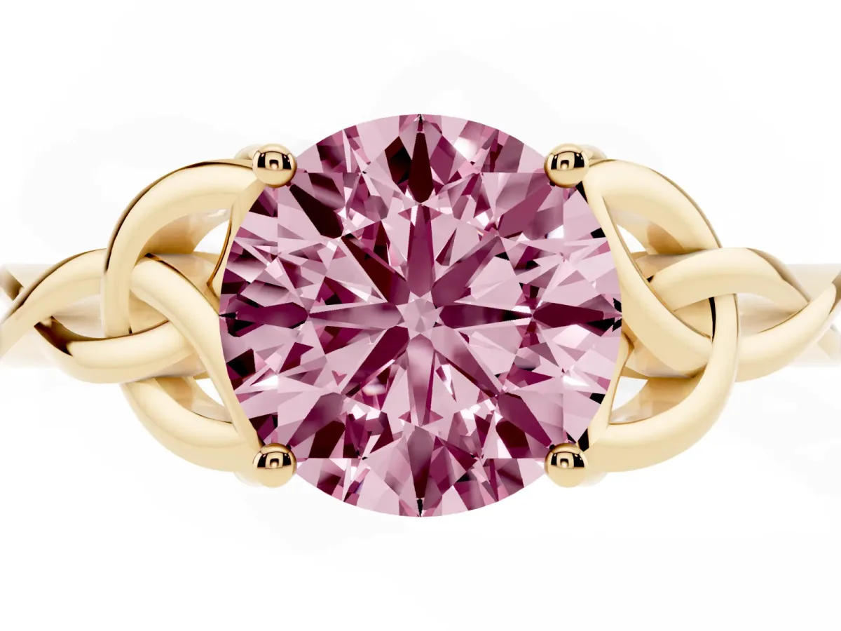 Fancy Pink Round Cut Diamond Solitaire Engagement Ring with Celtic Knot Band and Four-Prong Setting Yellow gold