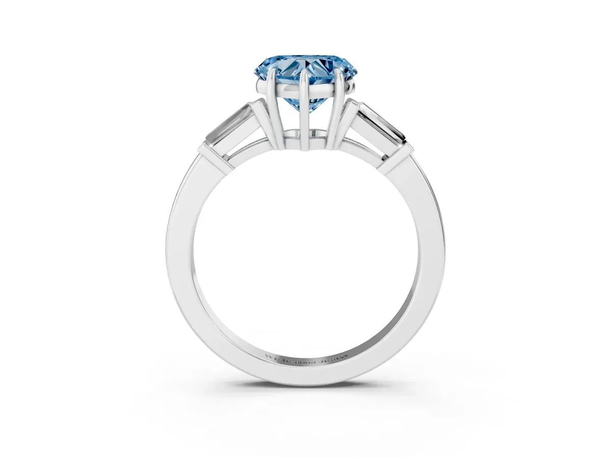 Fancy Blue Heart Cut Diamond Three-Stone Ring with Tapered Baguette Side Stones and Prong Setting Silver