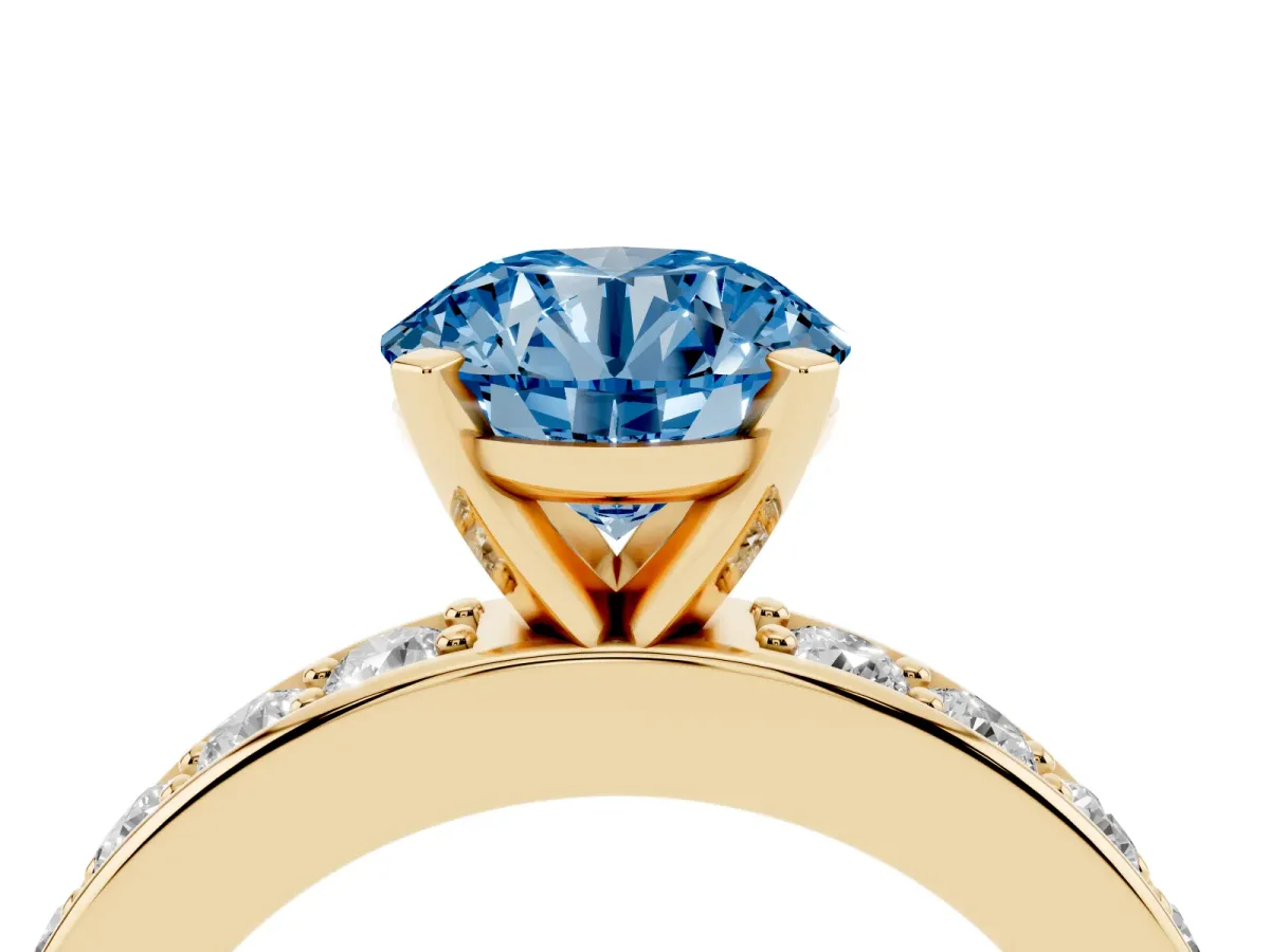 Fancy Blue Round Cut Diamond Engagement Ring with Channel Set Round Band and Prong Setting Yellow gold