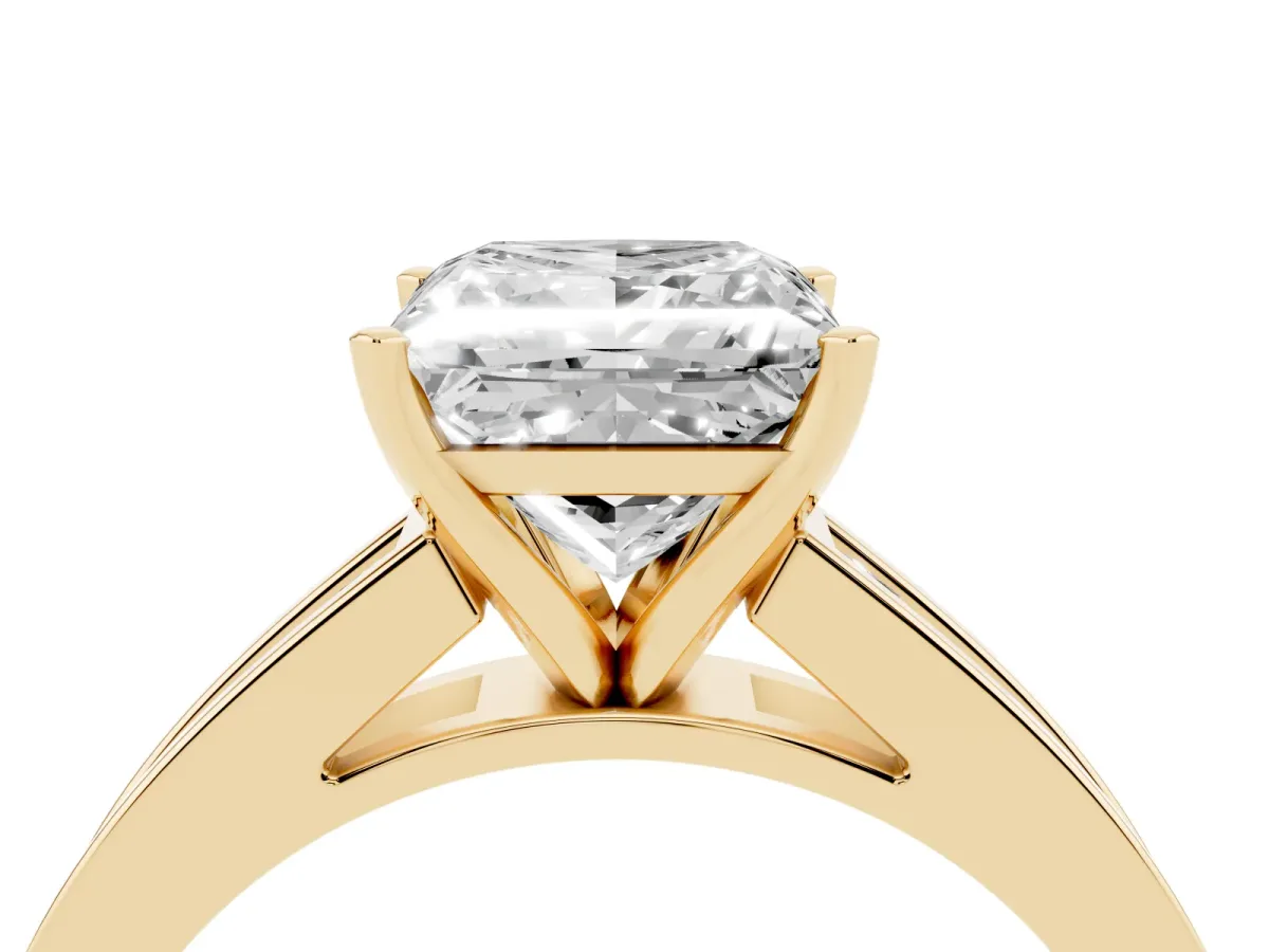 Princess Cut Solitaire Diamond Ring with Channel-Set Band and Four-Prong Setting Yellow gold